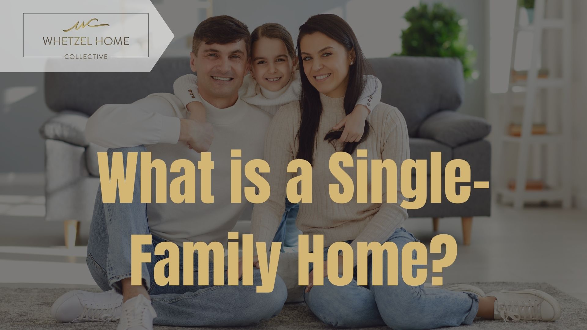 A family on a couch in a modern living room, highlighting warmth in a single-family home for Whetzel Homes Collective.