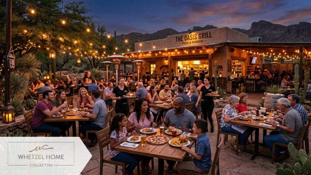A bustling outdoor patio of a casual family-friendly restaurant in the desert, hanging string lights illuminating the evening, diverse groups of people enjoying artisan pizzas and burgers, vibrant and lively mood, photorealistic.
