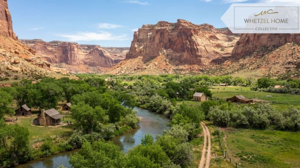 A wide landscape shot of a lush river valley with a few scattered historic rural homes, towering Utah sandstone cliffs in the background, vibrant green cottonwood trees, midday sunlight, highly detailed, photorealistic.