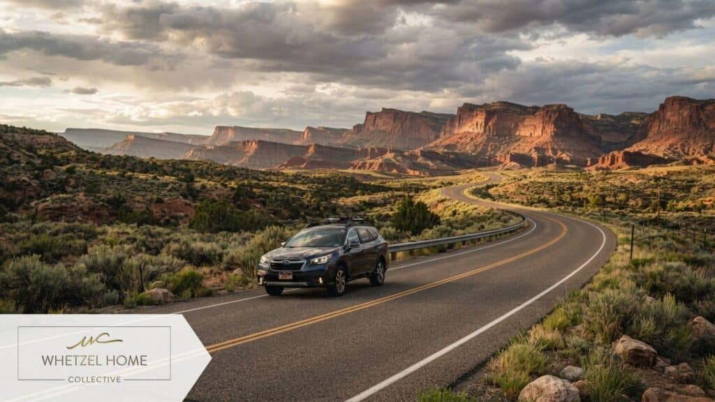 A scenic two-lane highway winding through a high desert landscape in Utah, flanked by sagebrush and distant red rock cliffs. A modern SUV drives along the road. Cinematic lighting, dramatic clouds, hyper-realistic, conveying a peaceful commute.
