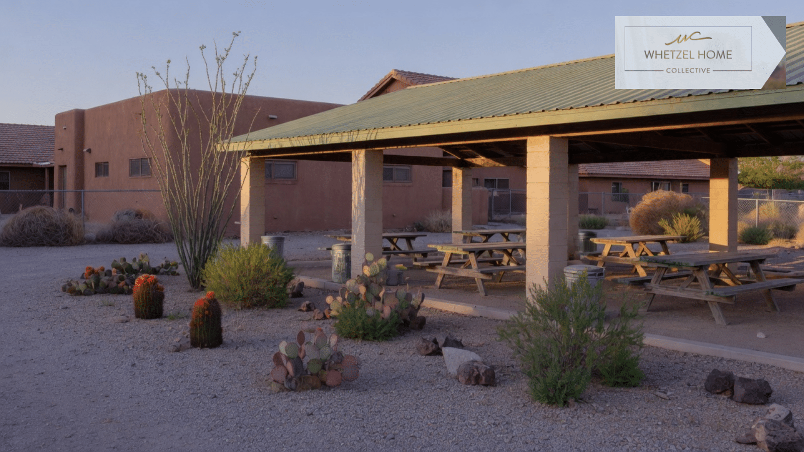A shaded picnic ramada in a desert neighborhood