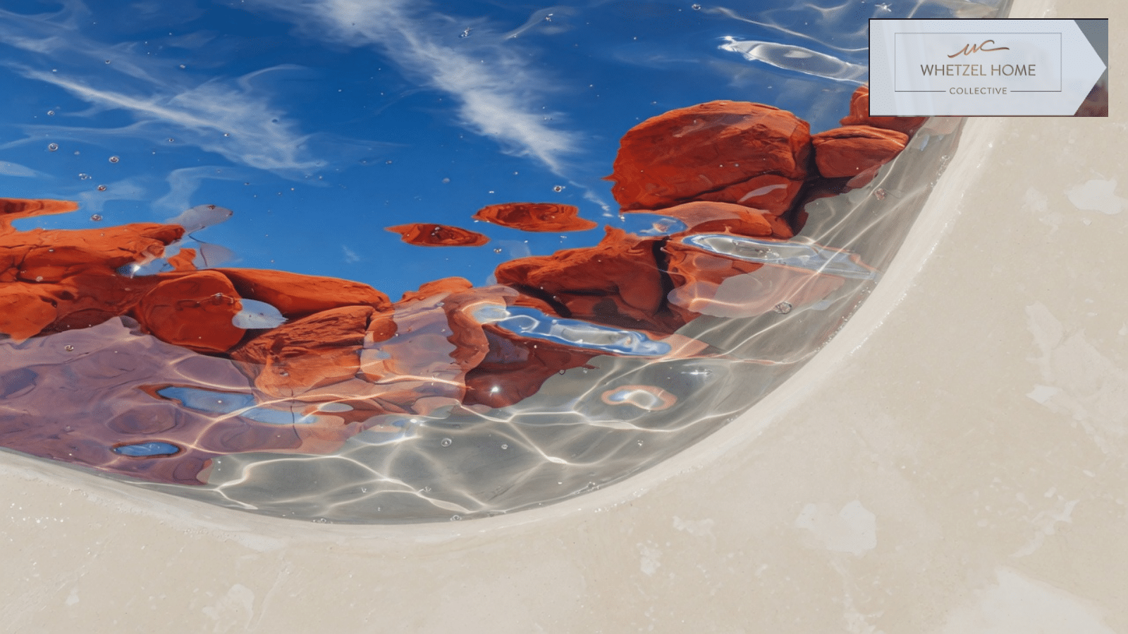 Pool waterline and plaster in desert sunlight