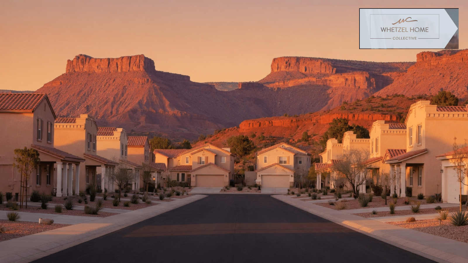 Stucco neighborhood street with red rock mesas in southern Utah