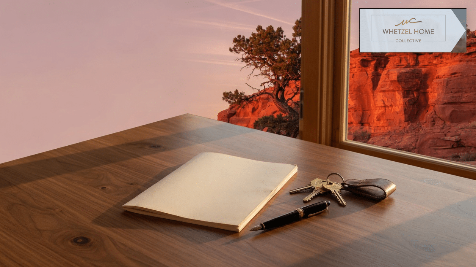 House keys on a closed title policy folder at sunset in southern Utah
