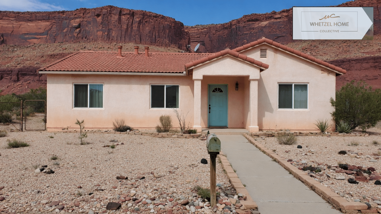A single-family desert home with gravel landscaping